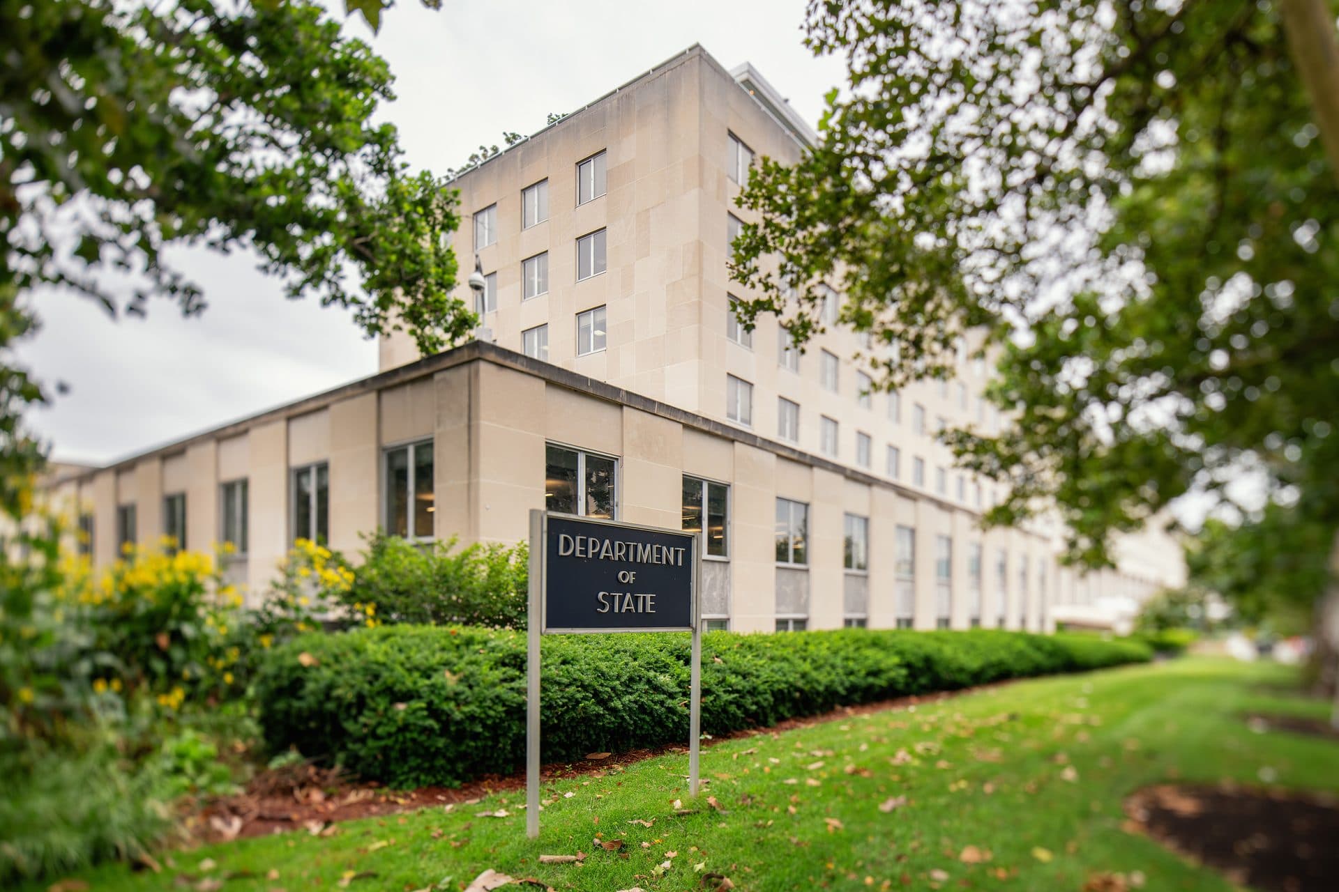 The U.S. Department of State's Harry S. Truman Building in Washington, D.C., with its sign on the lawn
