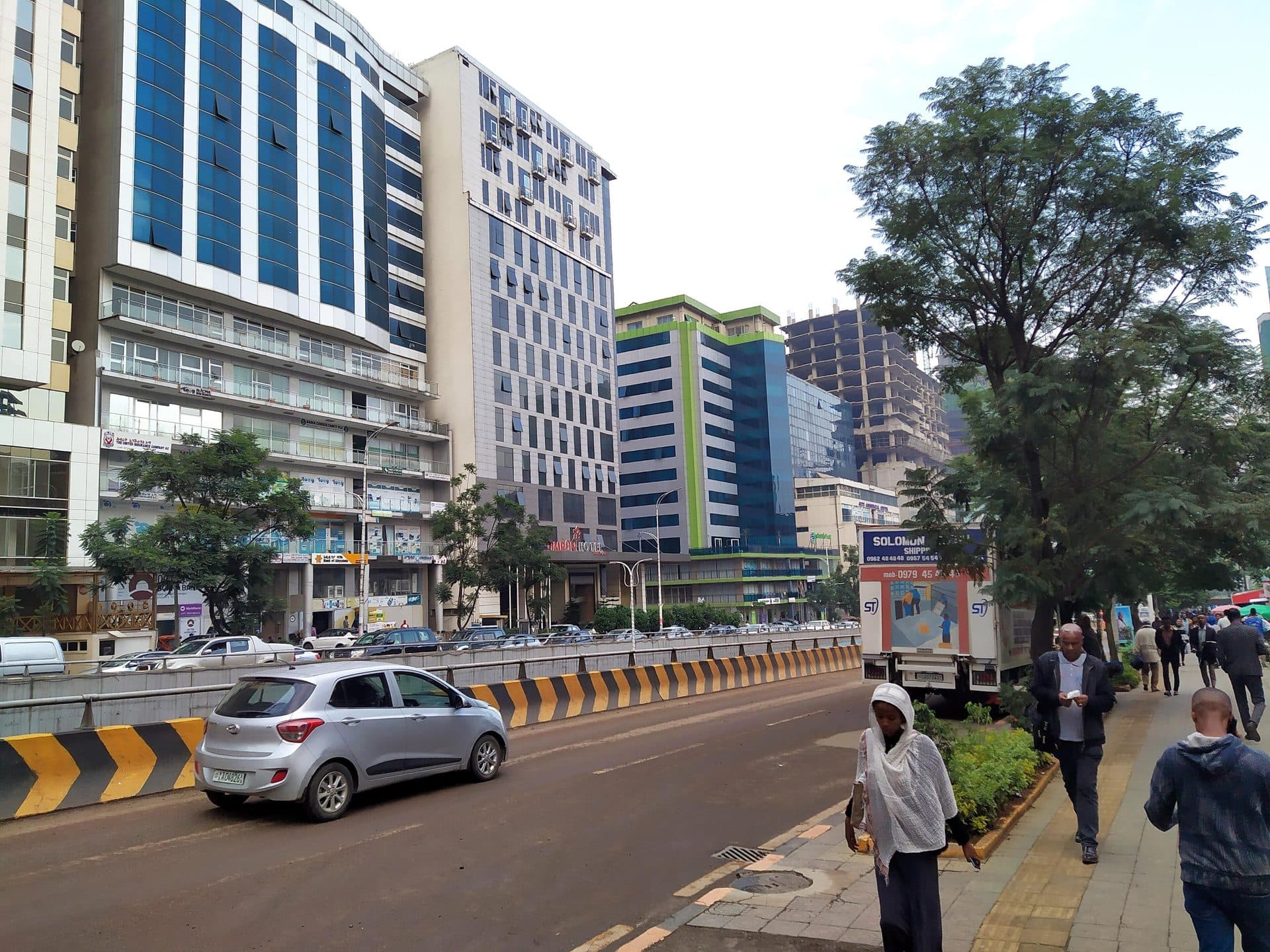 Glass office towers and traffic along Bole Road in Addis Ababa